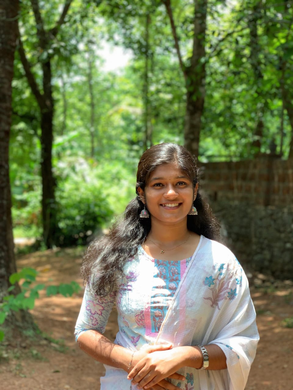 DHANUSREE TK